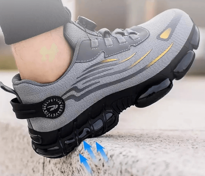 Modern men's athletic safety sneakers. Steel toe, puncture resistant, non-slip for protective, stylish work.