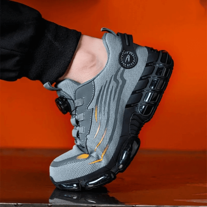 Durable men's safety sneakers. Indestructible design, steel toe, puncture resistant, non-slip, comfortable work footwear.