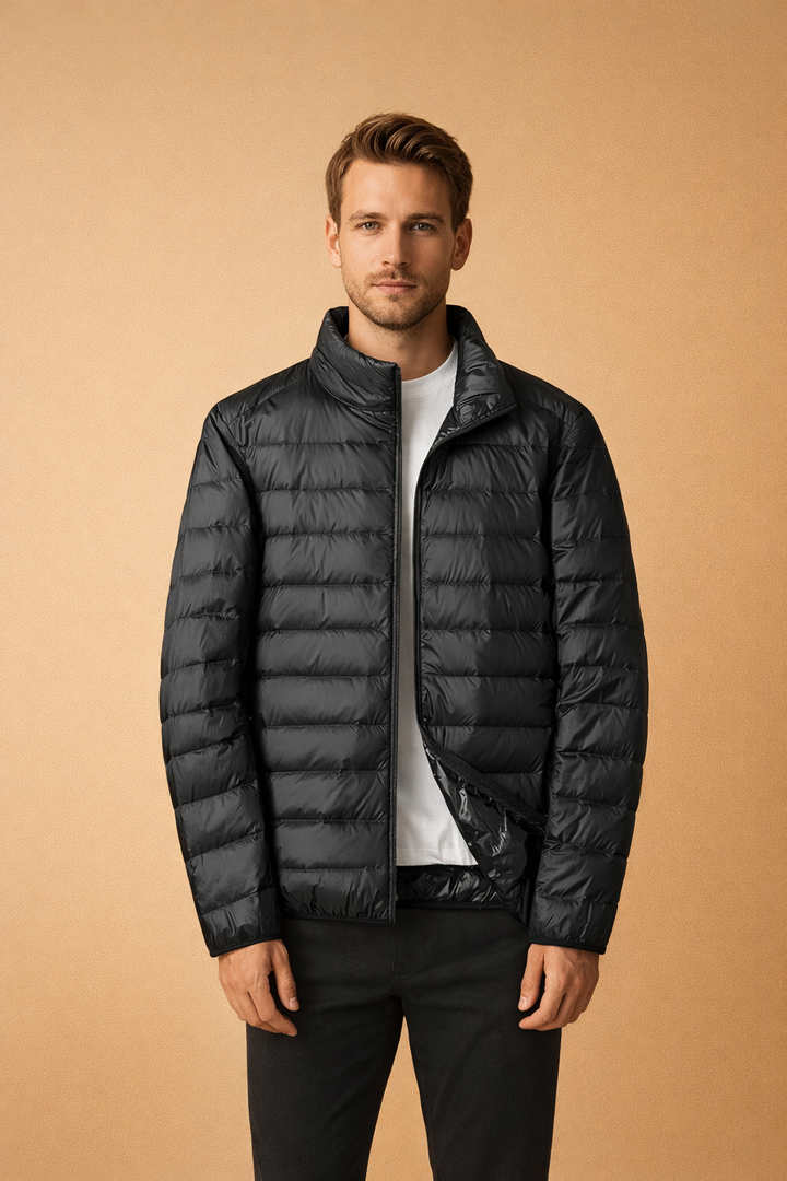 Stylish men's lightweight quilted zip jacket with full zipper, perfect casual outerwear for cool weather.