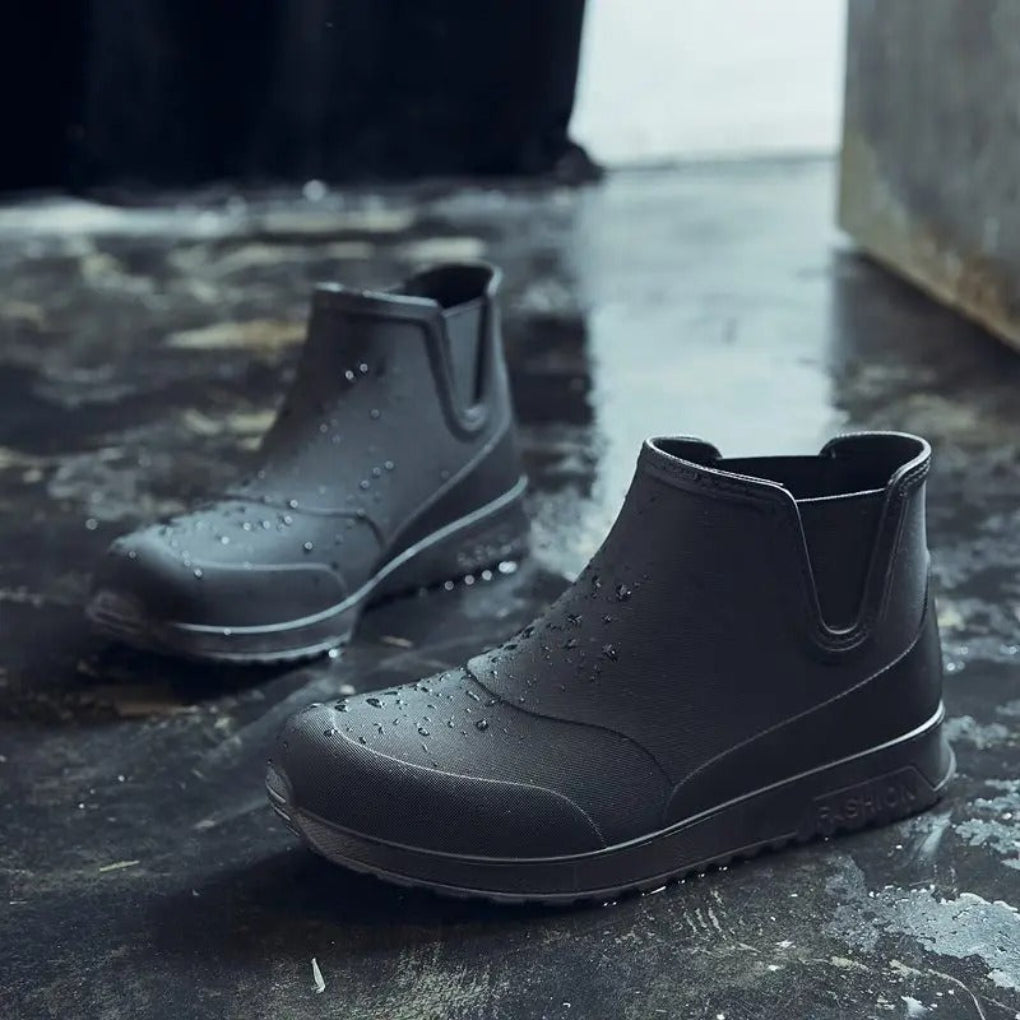 Easy slip-on men's waterproof rain boots. Lightweight & durable for protection in all wet weather conditions.