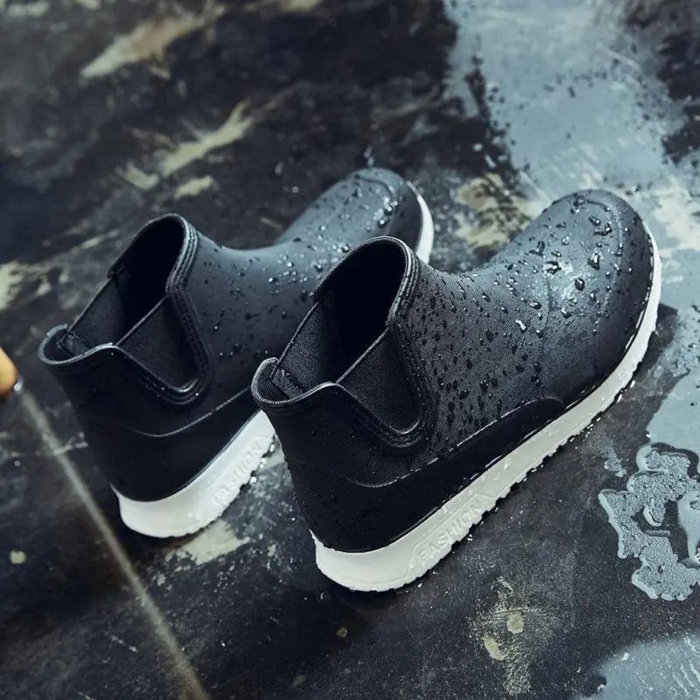 Comfortable men's lightweight waterproof outdoor boots. Slip-on design for easy wear in rain or garden work.