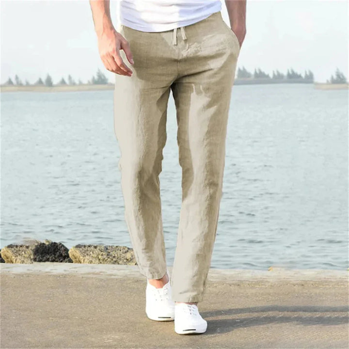 Khaki men's linen summer pants, straight leg, relaxed fit, ideal for breathable casual warm weather style.