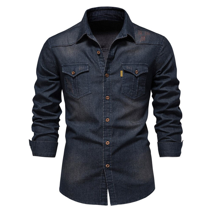 Casual men's long sleeve denim shirt in stretch cotton. Slim fit button-down for versatile styling.