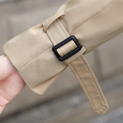 Men's long double-breasted trench coat, perfect outerwear with a smart belted design.