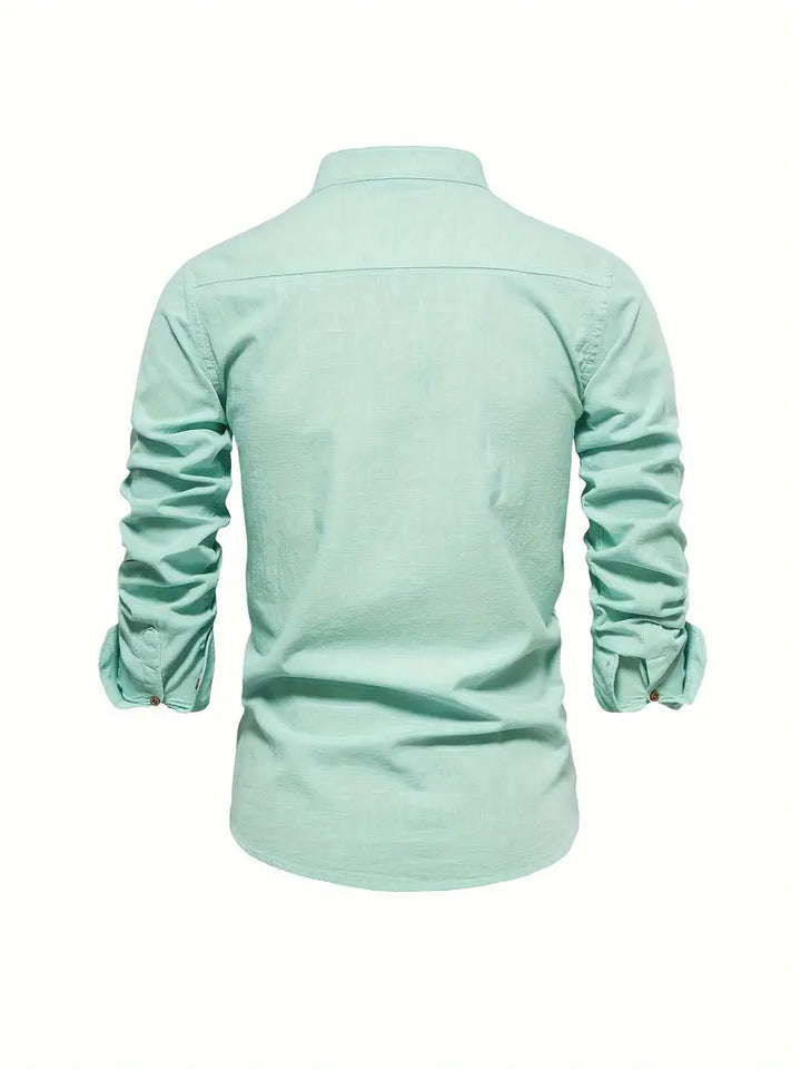 Man wearing a comfortable long sleeve stand collar button-up shirt, ideal for smart casual looks.