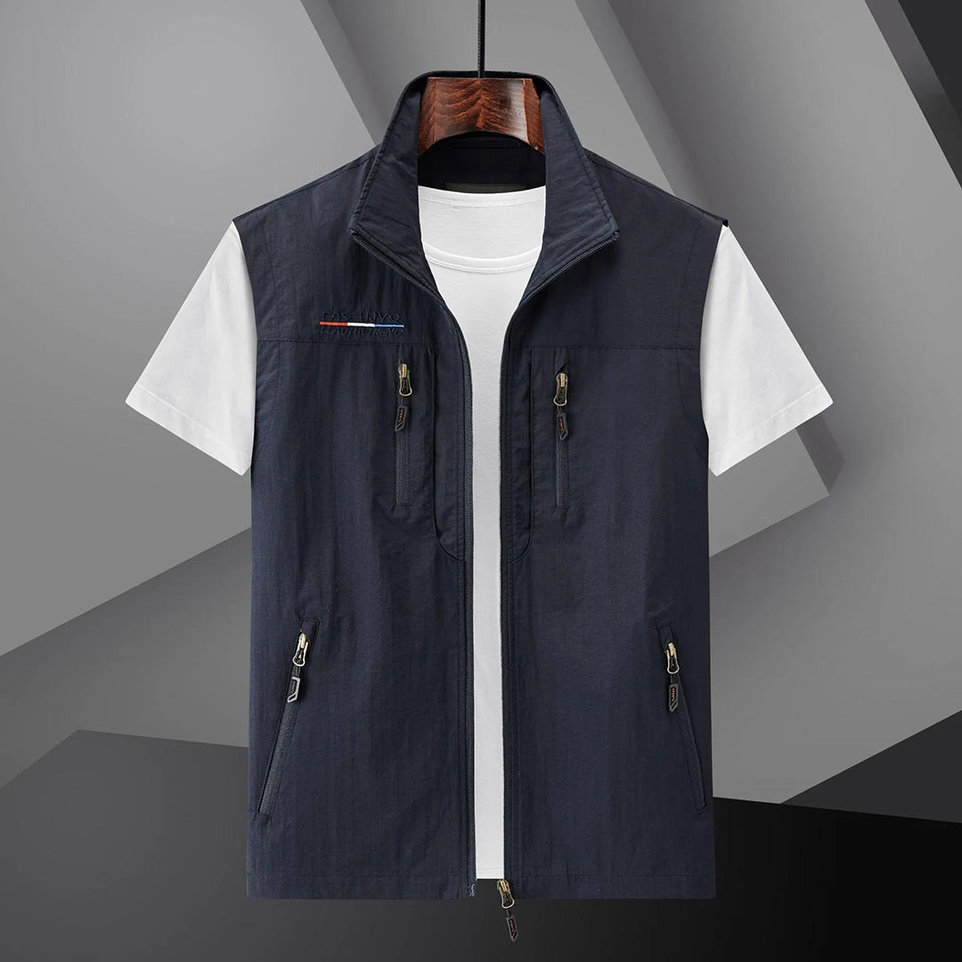 Men's multi-pocket utility travel vest for summer adventures. Breathable & lightweight for outdoor fishing & hiking.