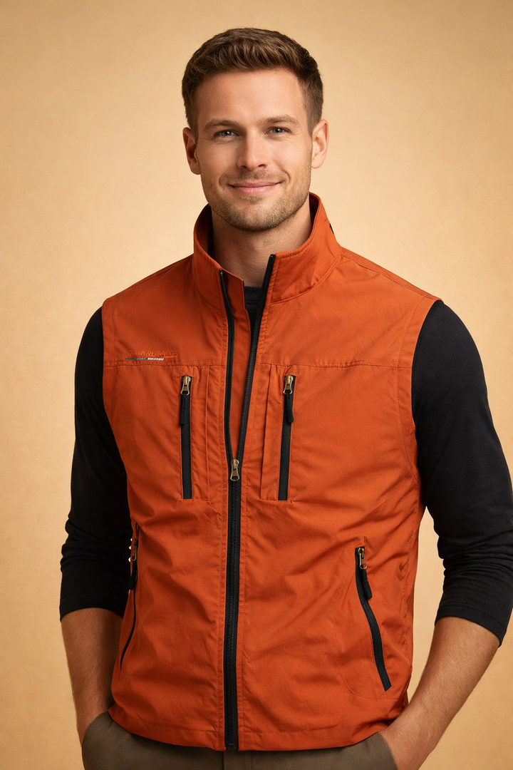 Men's outdoor utility vest with numerous multi-zip pockets, ideal for carrying tools and essentials.