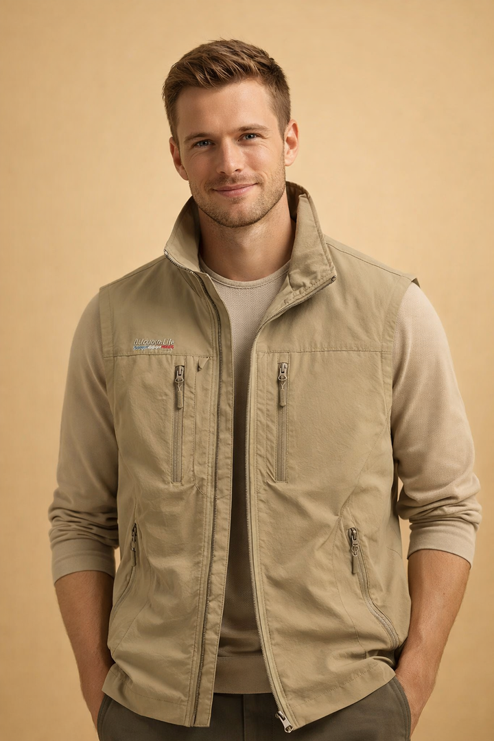 Functional men's bodywarmer vest for hiking, camping & travel, featuring multiple secure zip pockets.
