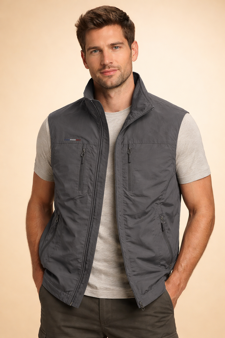 Stylish men's utility vest for casual wear, perfect for layering, with convenient multi-zip pockets.