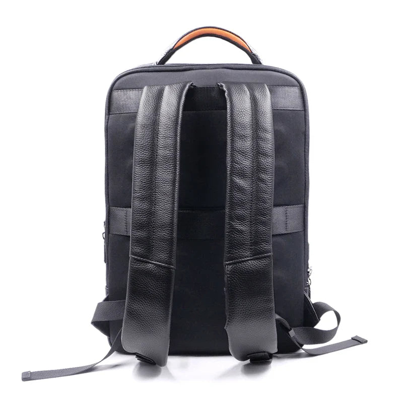 Luxury men's leather anti-theft backpack with biometric fingerprint access, combining style and high-tech security.