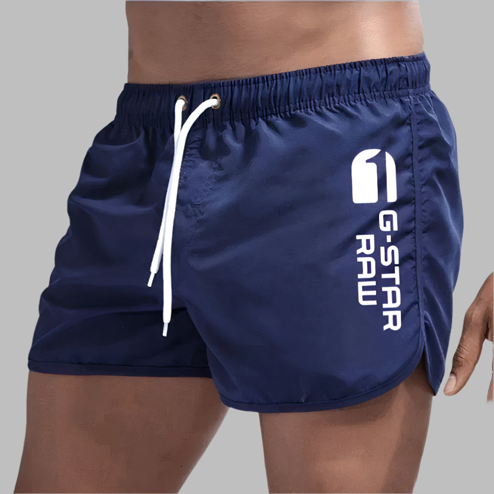 Men's quick-dry swimwear: solid color, lightweight, and breathable. Ideal for pool, beach, and activewear.