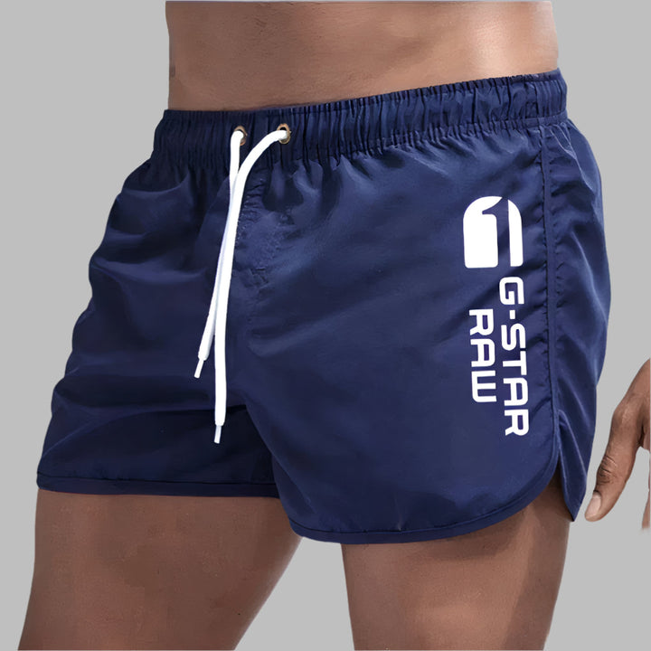 Men's quick-dry swimwear: solid color, lightweight, and breathable. Ideal for pool, beach, and activewear.