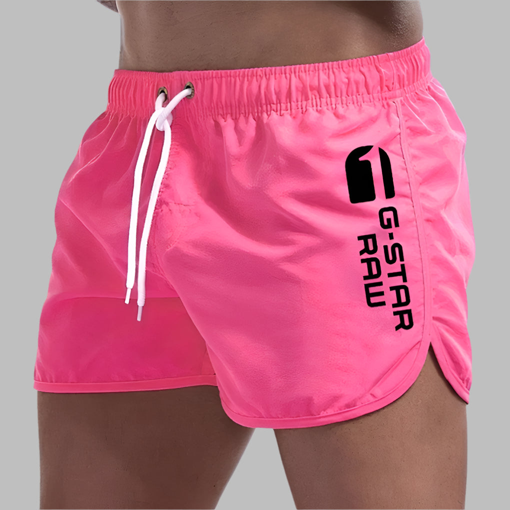 Stylish solid swim trunks for men. Quick-dry technology ensures comfort for pool, beach, and vacation.