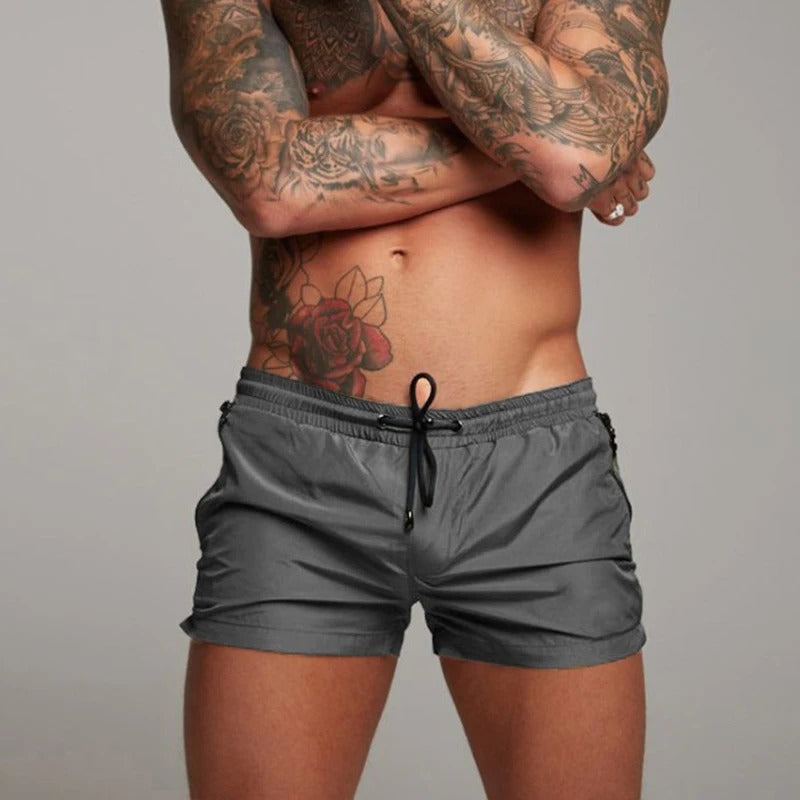 Men's quick dry stretchy swim shorts for beach & pool. Performance activewear.
