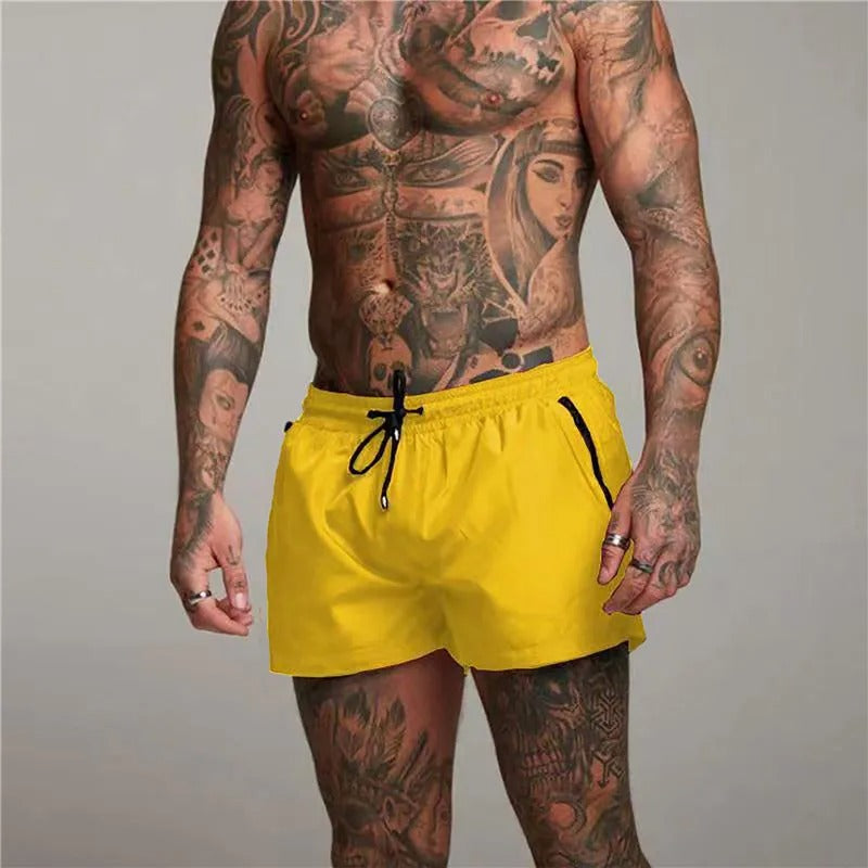 Stylish men's stretchy swim shorts, perfect for summer beachwear & poolside comfort.