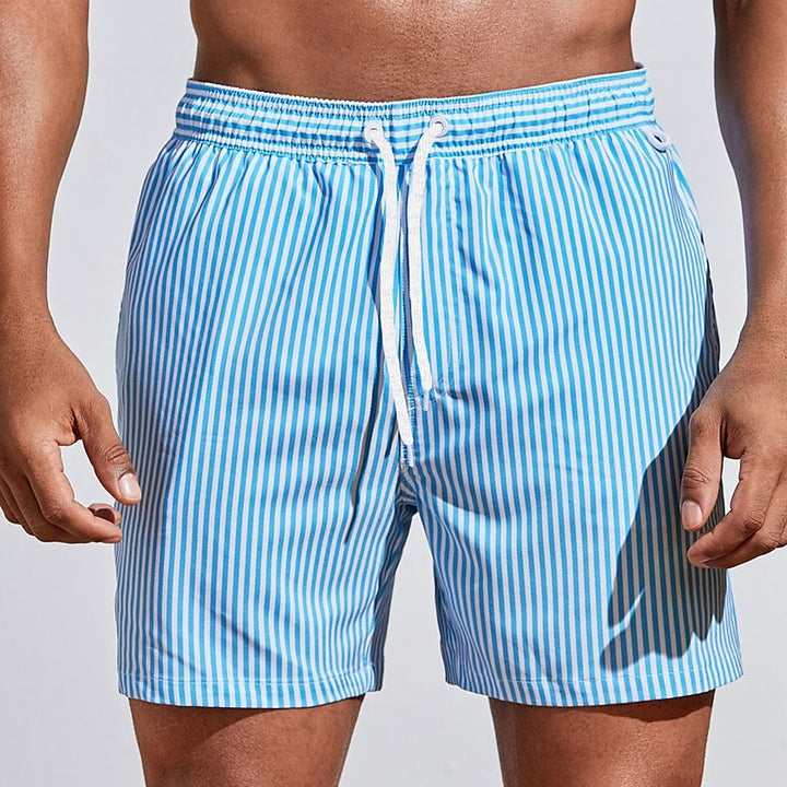 Striped men's drawstring swim shorts, ideal for summer beachwear & casual holiday fashion.