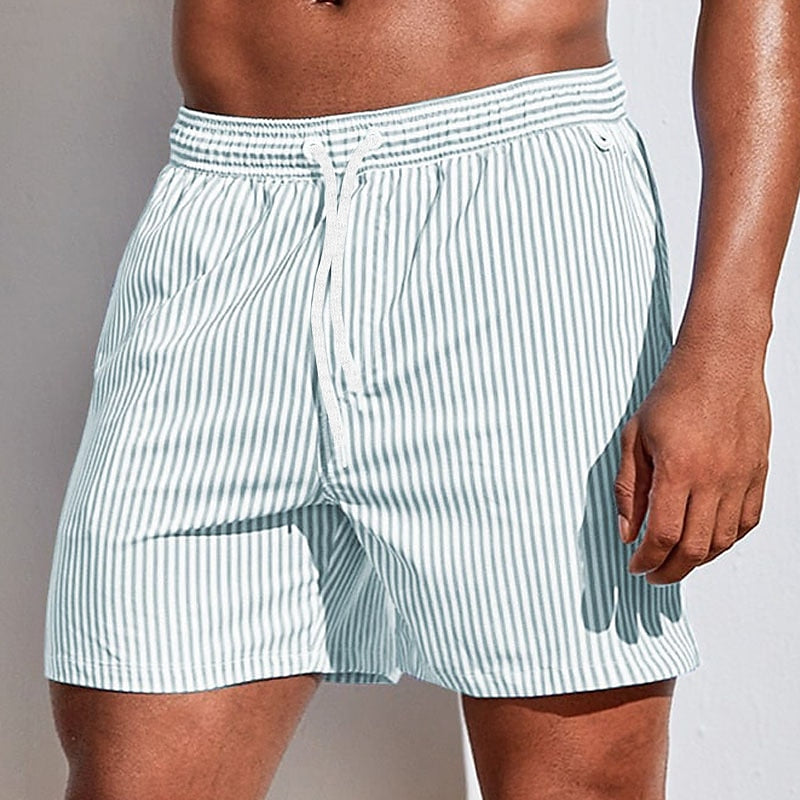 Quick dry men's striped swim trunks with drawstring, excellent for swimming, beach, or athletic use.