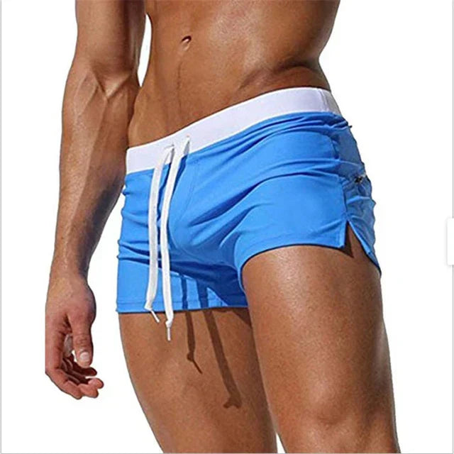 Comfortable men's quick-dry athletic shorts. Breathable swimwear for active beach & pool days. Men's fashion.