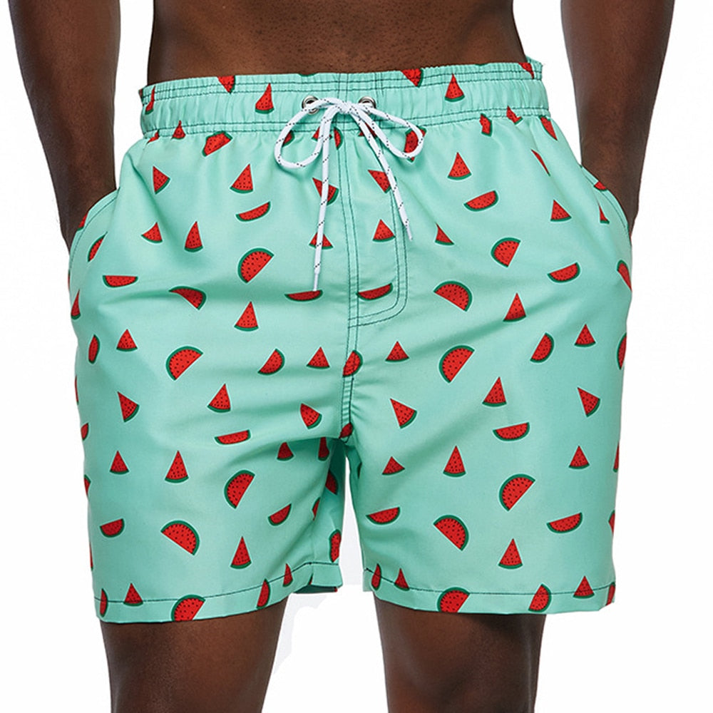 Comfortable men's quick-dry swimming shorts, ideal for warm weather, pool parties & beach days.