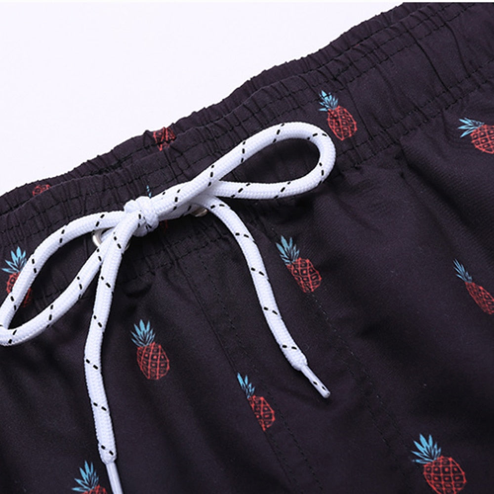 Stylish men's swim shorts with quick-drying fabric, ideal for beach, pool, or vacation.