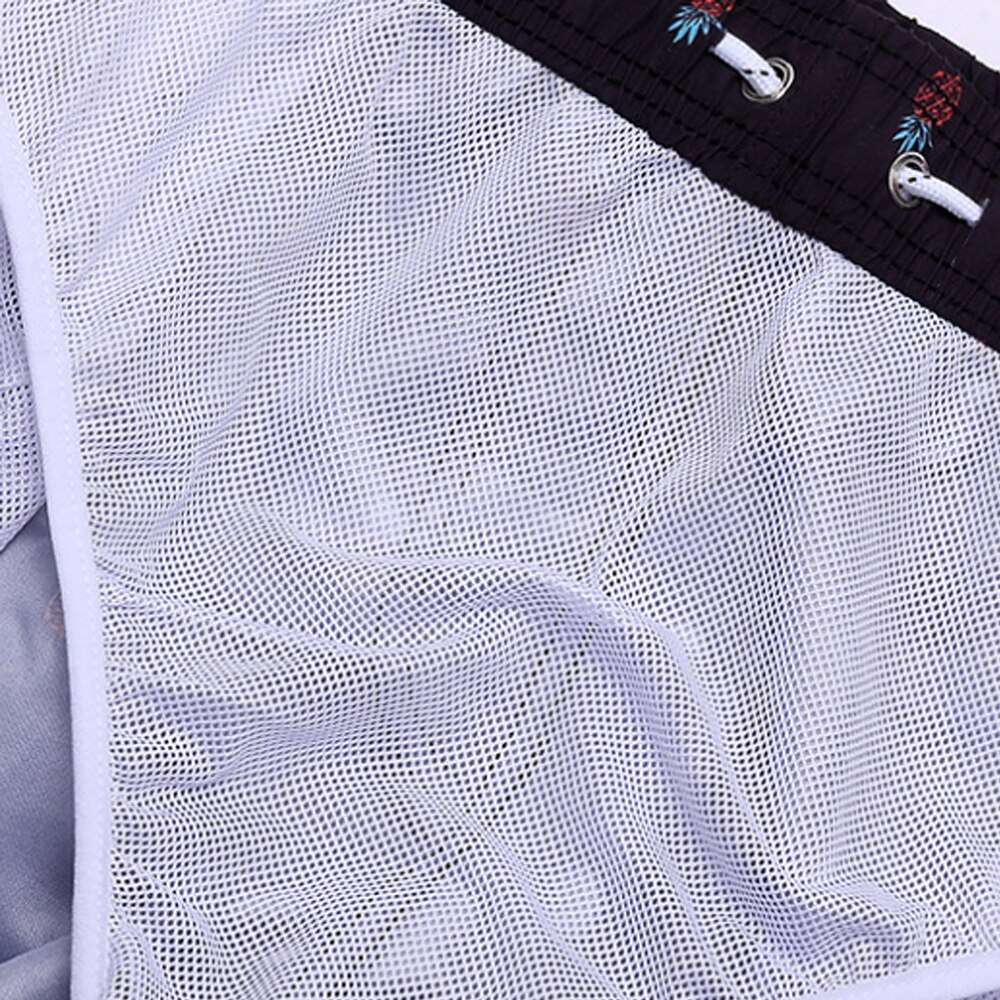 Vibrant men's quick-dry swimming shorts, essential beachwear for summer vacations.