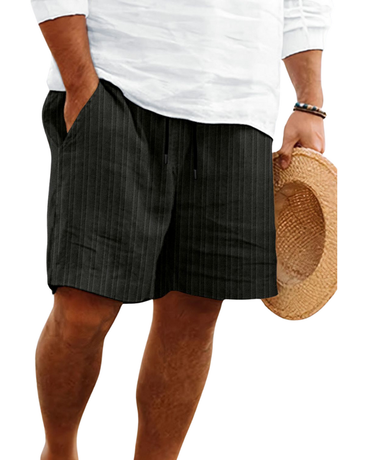 Textured view of men's casual drawstring shorts, breathable fabric for a relaxed fit, summer & everyday wear.