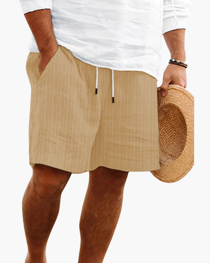 Men's relaxed fit drawstring shorts, showcasing functional side & back pockets, great for casual everyday utility.
