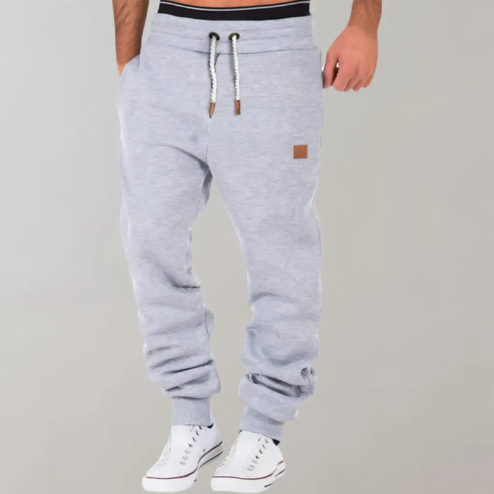 Relaxed fit men's jogger pants perfect for casual wear, lounging, or light athletic activities.