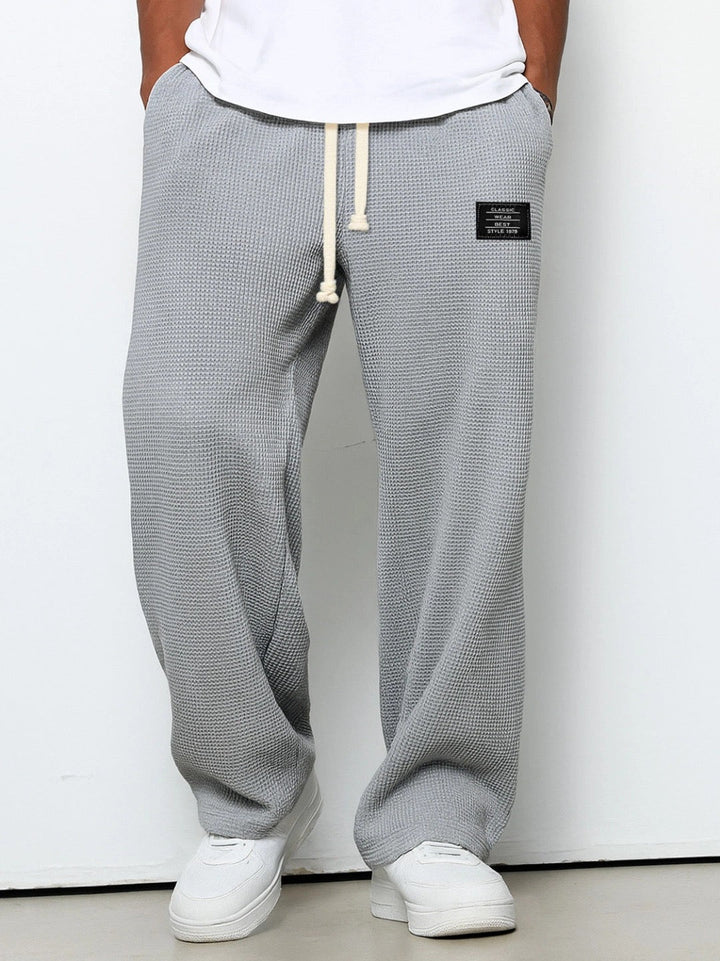 Soft knit men's casual pants, relaxed fit drawstring sweatpants for ultimate everyday comfort.
