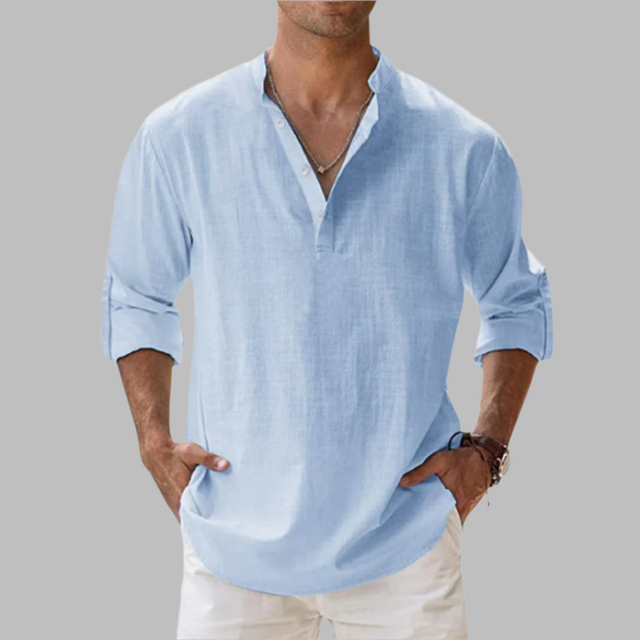 Men's relaxed fit long sleeve button-down summer shirt for casual wear, beach, or vacation.