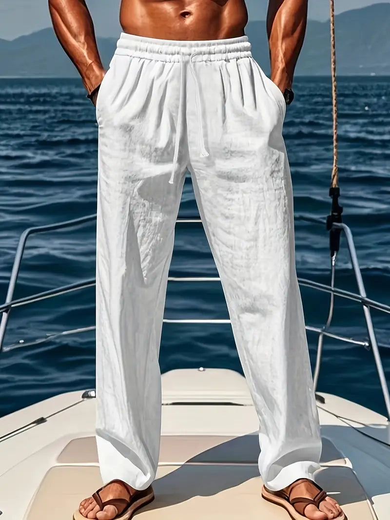 Men's relaxed fit summer trousers in a lightweight, breathable fabric, perfect for casual wear and warm weather travel.