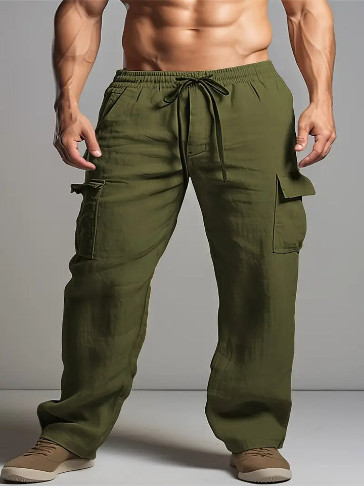 Man in comfortable men's relaxed fit summer trousers. Smart casual style, great for work, events, or stylish daily wear.