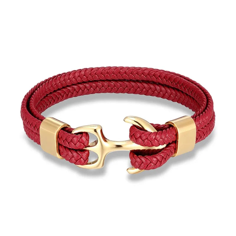 A man's wrist wearing a stylish nautical anchor leather bracelet, emphasizing rugged men's fashion.