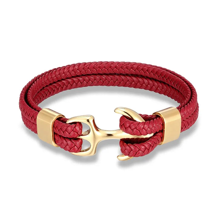 A man's wrist wearing a stylish nautical anchor leather bracelet, emphasizing rugged men's fashion.