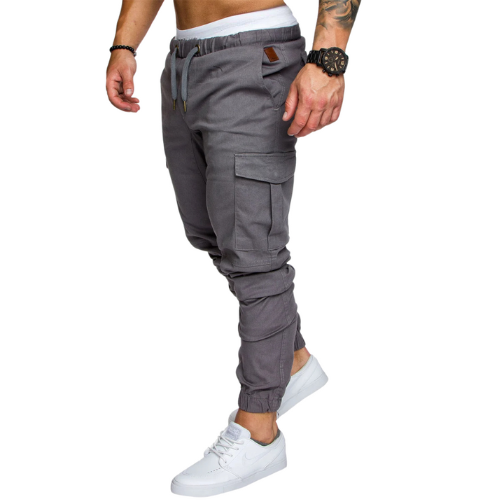 Utility men's cargo joggers, rugged style, multi-pocket design, tapered leg.