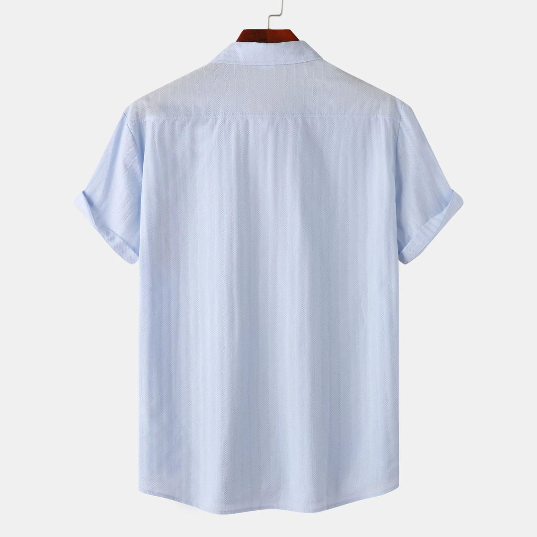 Versatile men's casual shirt, short sleeve button-down. Effortless comfort for summer wear.
