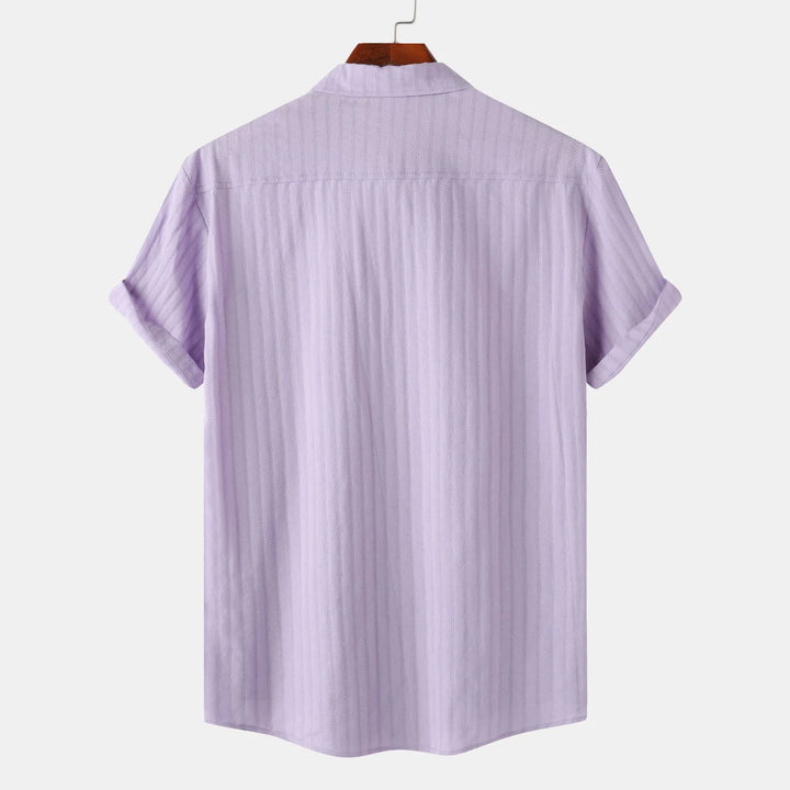 Collared men's button-down shirt, short sleeves. Ideal for smart casual summer fashion & comfort.