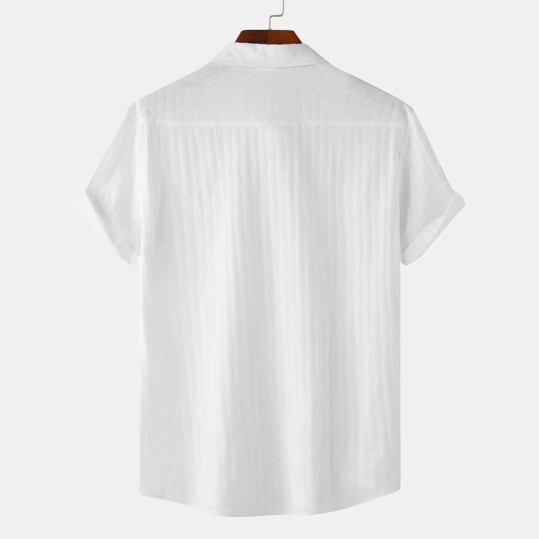 Stylish men's button-down shirt with short sleeves. Great for casual outings & summer comfort.