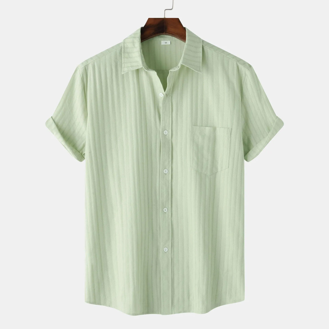 Effortless men's fashion: short sleeve button-down shirt. Comfortable & versatile for summer.