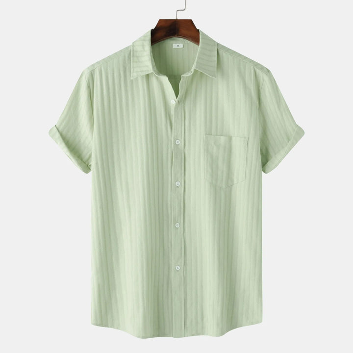 Effortless men's fashion: short sleeve button-down shirt. Comfortable & versatile for summer.