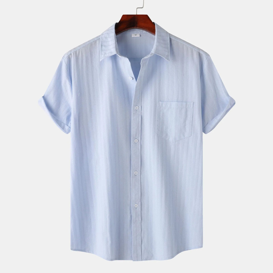 Stylish & comfortable men's short sleeve shirt, button-down front. Essential summer fashion.