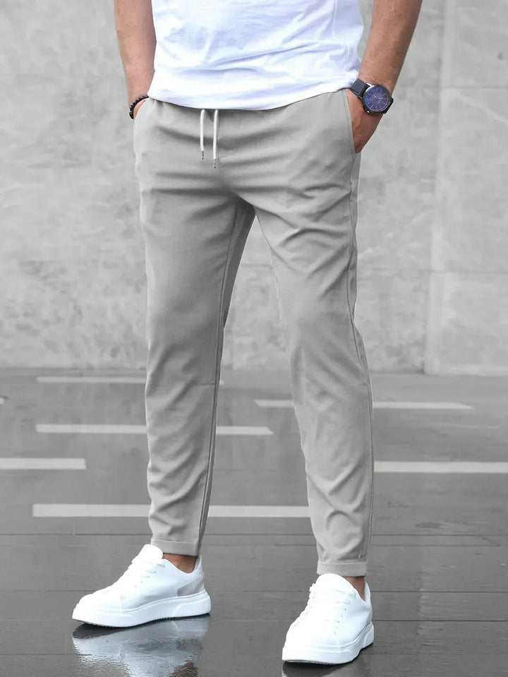 Men's slim-fit flexible pants, ideal for work, business casual, or stylish everyday wear.