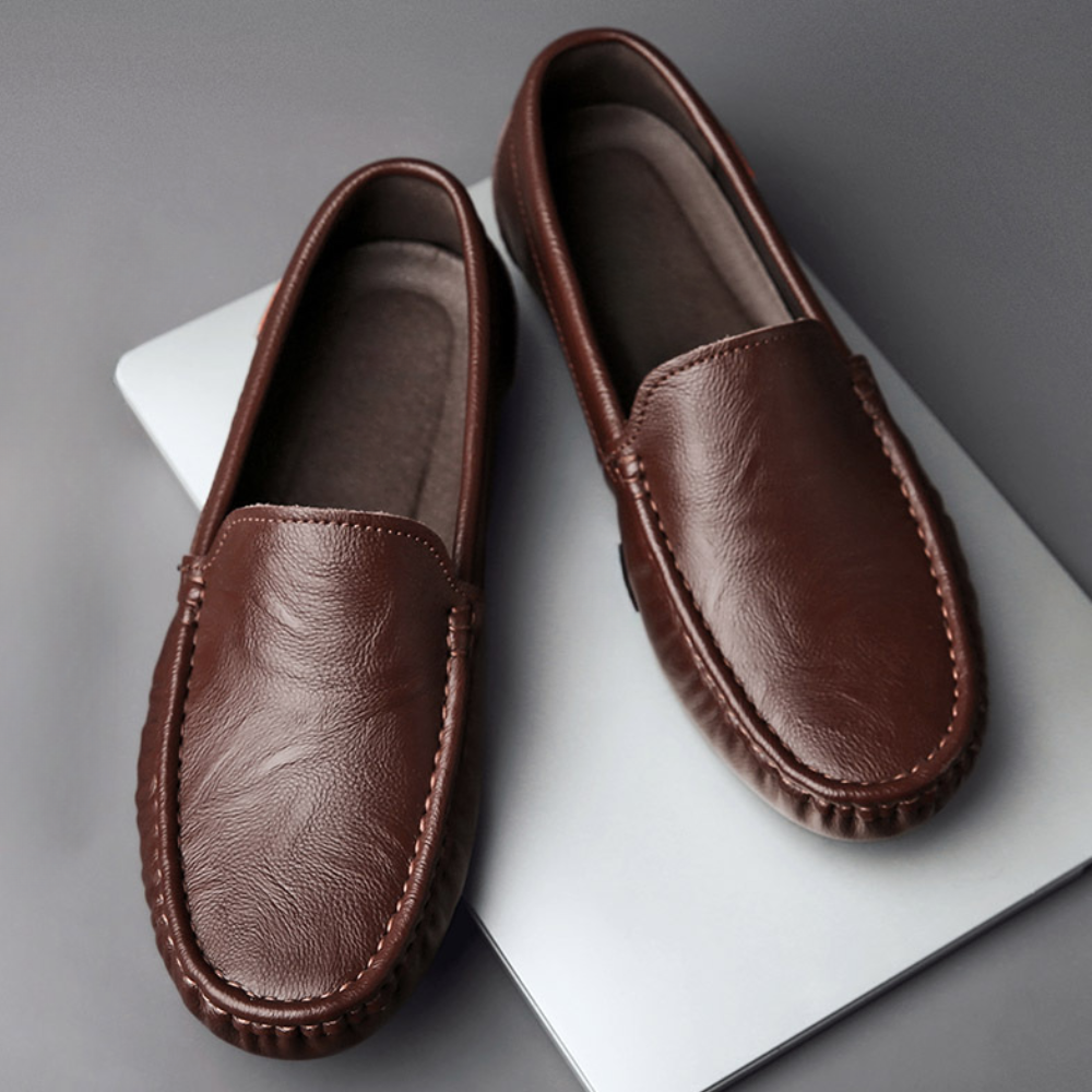 Classic men's slip-on work loafers, offering professional style and comfort for office and casual settings.
