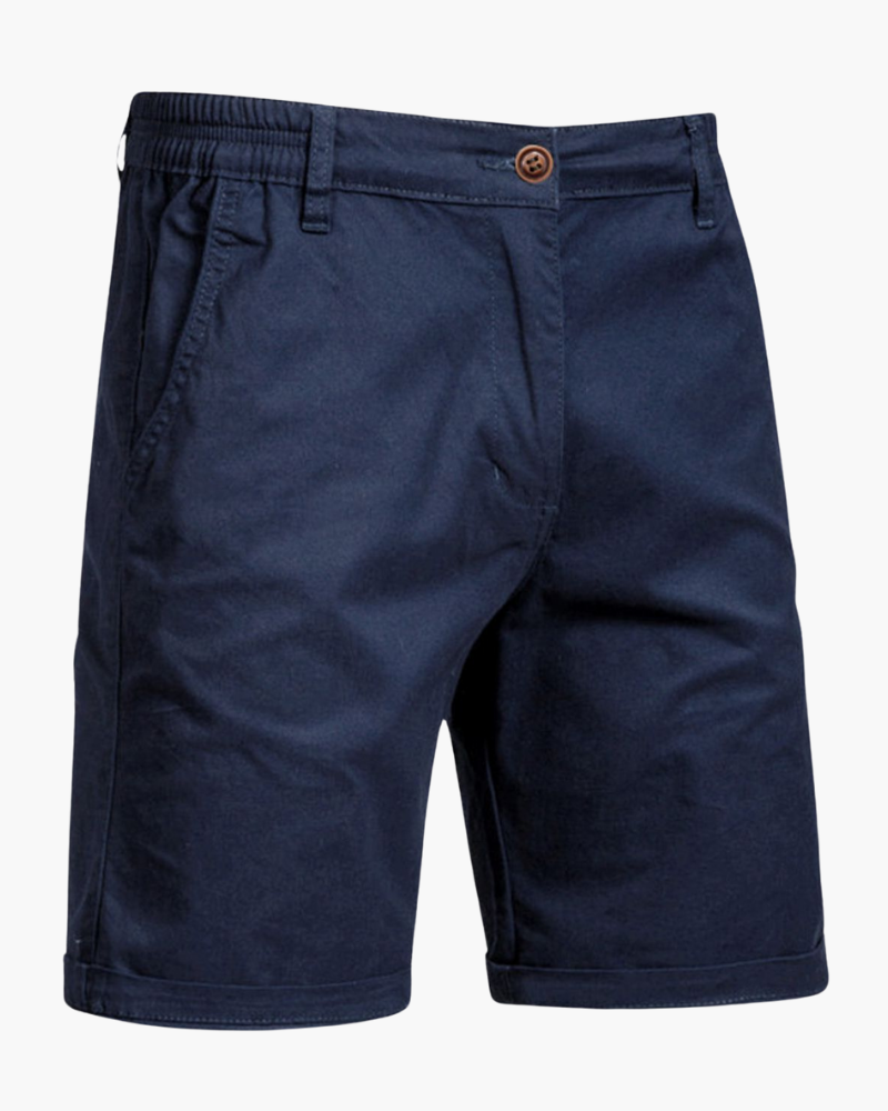 Man sitting comfortably in men's smart casual chino shorts, showcasing flexibility for versatile summer wear.