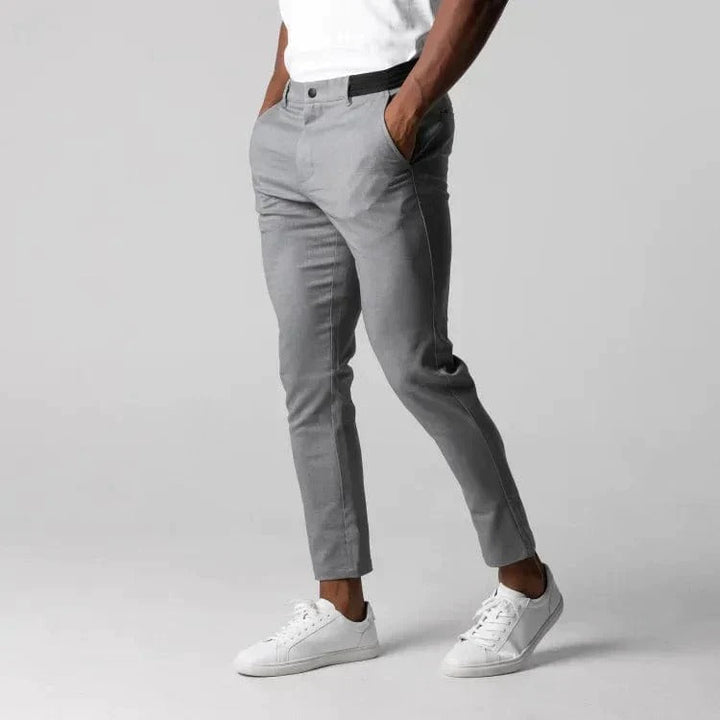 Soft cotton blend men's stretch chino pants, offering maximum comfort and flexibility for daily wear. Slim fit.