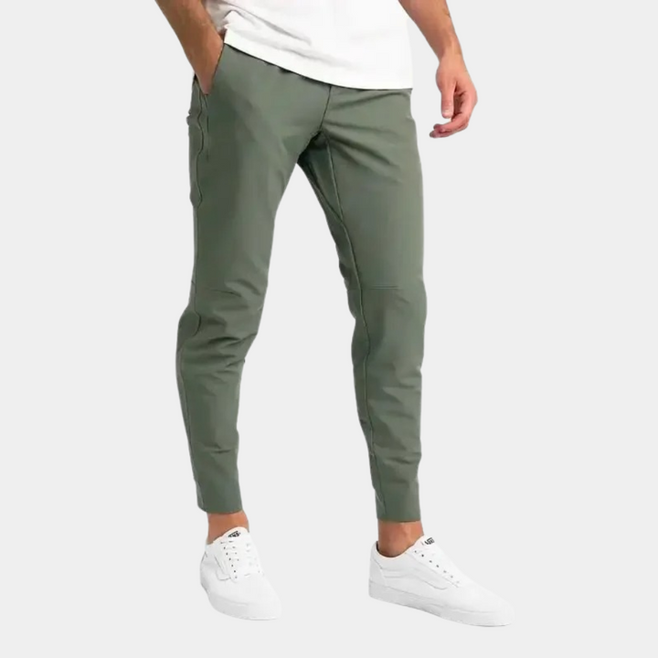 Versatile men's stretch pants, perfect for travel, casual outings, & everyday comfort. Wind & water resistant.