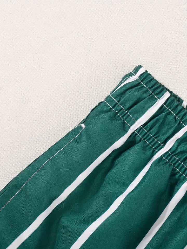 Men's striped swim shorts, drawstring waist. Ideal beachwear, mens swimwear, and summer vacation fashion.