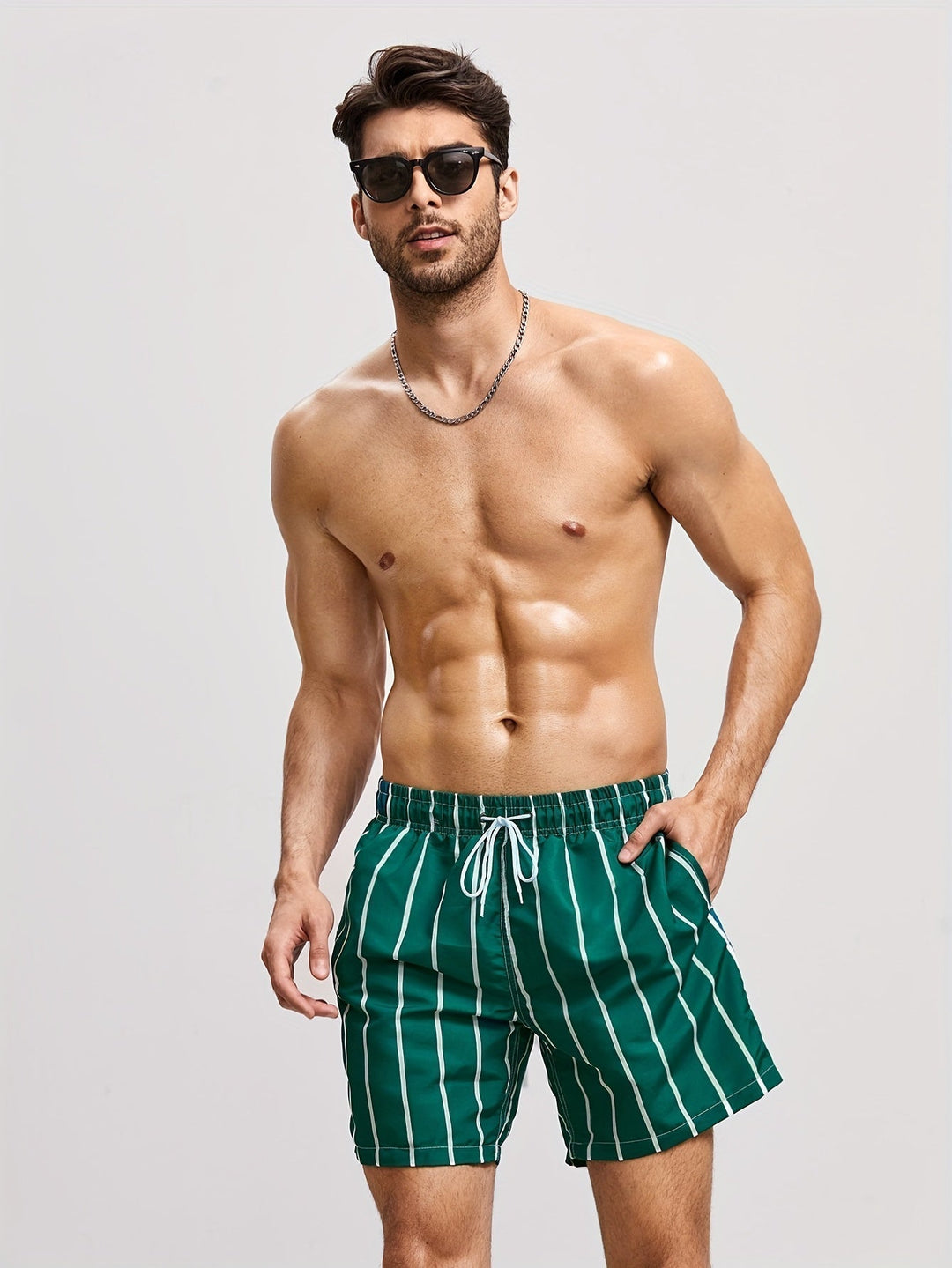Classic striped men's swim shorts with a secure drawstring waist. Durable casual shorts for swimwear.