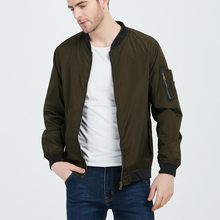 Men's stylish bomber jacket with a practical utility sleeve pocket. Perfect for casual, modern autumn wear.