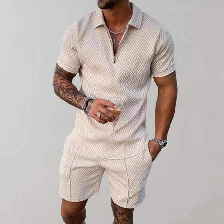 Relaxed fit men's summer outfit: comfortable polo shirt & shorts combo. Perfect for casual wear and warm weather.